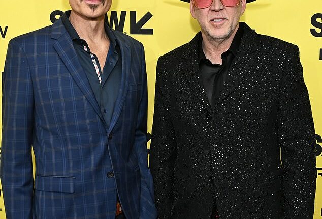 Julian's last public appearance was alongside Nicolas Cage at SXSW in Texas in March where he looked thin as he promoted The Surfer - he died from lung metastasis