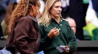 Katie Boulter (right) arrived on Centre Court on Monday morning to cheer on her fiance Alex De Minuar