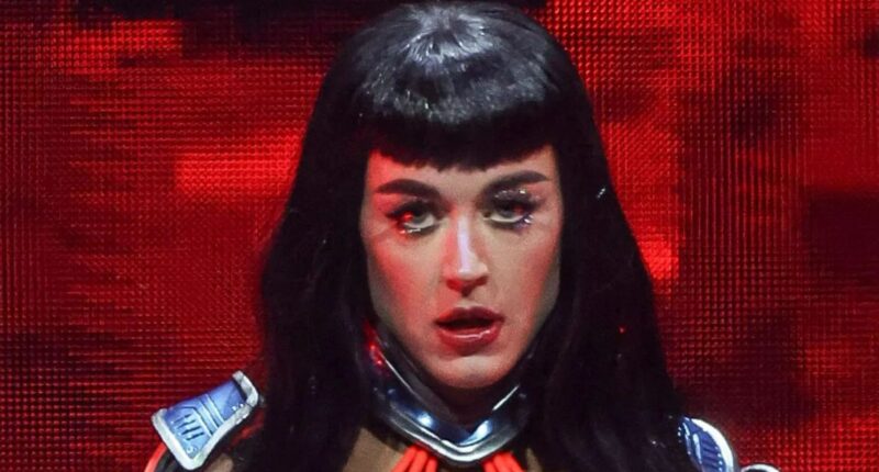 Katy Perry desperately clings on as prop malfunctions mid-air during gig leaving audience terrified