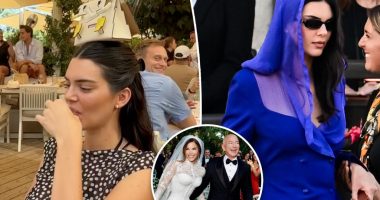 Kendall Jenner takes a shot while balancing $75K handbag on her head after attending ‘tone-deaf’ Bezos wedding