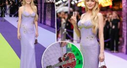 Lindsay Lohan rocks mini bedazzled guitar purse on ‘Freakier Friday’ UK premiere red carpet