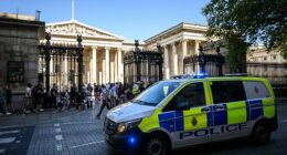 A police van outside the main entrance gates of the British Museum in London in August 2023