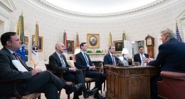 Sources told NBC News that Mark Zuckerberg 'walked in unexpectedly' and was asked to leave during a meeting in the Oval Office (Pictured: Zuckerberg and Facebook executives attend a meeting with Trump in 2019)