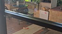 The McDonalds dining room and outdoor area were both covered in rubbish from customers
