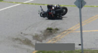 The crash scene on State Road A1A on Thursday afternoon. The victim--blocked out--remained at the scene until the medical examiner claimed the body in mid-afternoon. (© Bob Ziolkowski for FlaglerLive)