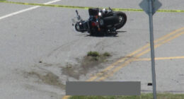 The crash scene on State Road A1A on Thursday afternoon. The victim--blocked out--remained at the scene until the medical examiner claimed the body in mid-afternoon. (© Bob Ziolkowski for FlaglerLive)