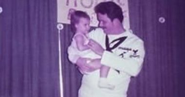 My father, Ed Bigley, a navy veteran, was a strict and sometimes gruff parent - but he was also my best friend and had a gentle side (the author, Shae Willis, is pictured as a toddler with her dad at one of his homecomings)