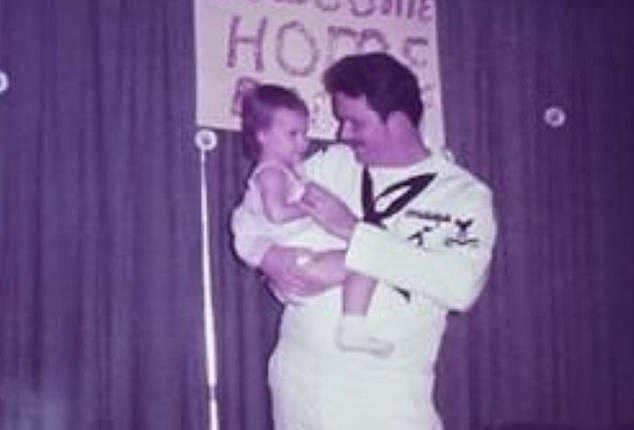 My father, Ed Bigley, a navy veteran, was a strict and sometimes gruff parent - but he was also my best friend and had a gentle side (the author, Shae Willis, is pictured as a toddler with her dad at one of his homecomings)
