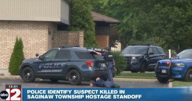 Police dangled Faygo bottle in front of hostage-taker to lure him out and shoot him during tense standoff at bank