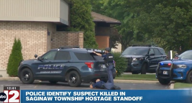 Police dangled Faygo bottle in front of hostage-taker to lure him out and shoot him during tense standoff at bank