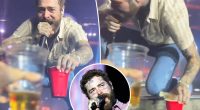 Post Malone takes nasty spill off concert stage while toasting fan with red Solo cup