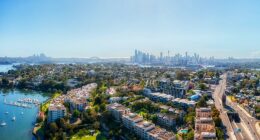 Real estate agents are charging more for the same amount of work, experts say (an aerial shot of Rozelle, in Sydney's inner west is pictured)