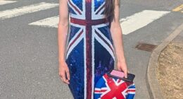 Courtney Wright poses for a photo showing her costume after being made to leave school on culture day