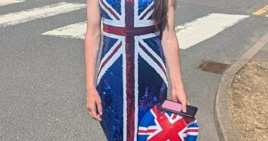 Courtney Wright poses for a photo showing her costume after being made to leave school on culture day