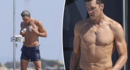Shirtless Tom Brady rinses off in outdoor shower while yachting in Ibiza on Fourth of July