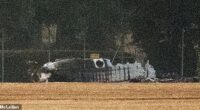 Charred wreckage of the 40ft-long Beech B200 aircraft was seen yards from the runway yesterday evening