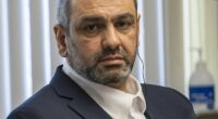 Ihsan Ali, 44, listens on Wednesday as his daughter Fatima Ali tells the court at his attempted murder trial how he tried to choke the life out of her in an alleged 'honor killing'