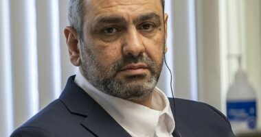 Ihsan Ali, 44, listens on Wednesday as his daughter Fatima Ali tells the court at his attempted murder trial how he tried to choke the life out of her in an alleged 'honor killing'