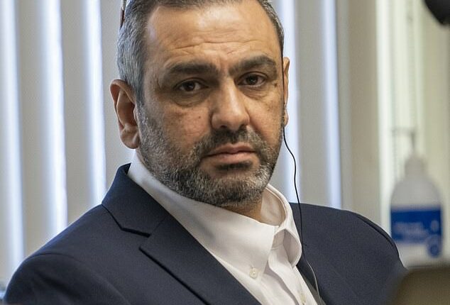 Ihsan Ali, 44, listens on Wednesday as his daughter Fatima Ali tells the court at his attempted murder trial how he tried to choke the life out of her in an alleged 'honor killing'