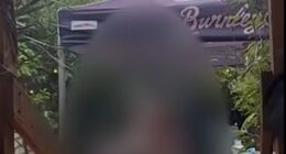 An unidentified woman is recorded by diners at Toorak Cellars in Armadale