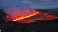 Lava emerges through a fissure following a volcano eruption near Grindavik, Reykjanes, Iceland July 16, 2025