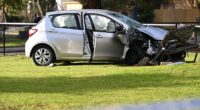 A woman is dead and two others were seriously injured after being hit by a car while walking on the footpath