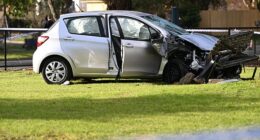 A woman is dead and two others were seriously injured after being hit by a car while walking on the footpath