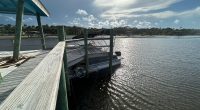 The pontoon boat crashed into and under the dock on the Intracoastal. (FBFD)