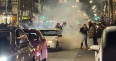 Melbourne Chapel Street was brought to a standstill on Saturday night by hoons (pictured)