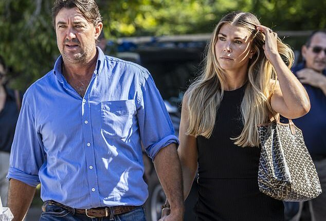 Outback Wrangler Matt Wright arrives at an NT court this week with his wife Kaia Wright
