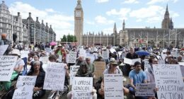 Militant protesters were accused of a 'colossal' waste of millions of pounds of taxpayers' money after more than 360 deliberately forced police to arrest them by brandishing signs supporting the outlawed group Palestine Action