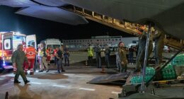 A 20-year old Palestinian woman described as being in a 'state of severe physical deterioration' has died after being transferred to Italy for treatment. Pictured: An Italian Air Force aircraft  lands at Pisa Airport carrying 12 Palestinian patients and their families evacuated from the Gaza Strip