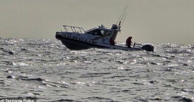 Authorities are still searching for a man and woman in their 70s and 60s after a light aircraft vanished (above, a Tasmania Police boat)