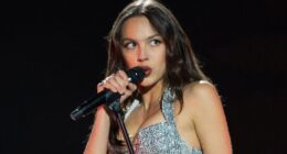 Olivia Rodrigo puts on leggy display in tiny silver miniskirt and matching corset for Lollapalooza performance