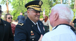 Charles Gambaro, a brigadier general in the Army Reserve, speaking with Ed Fuller at last May