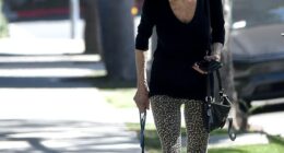 This iconic glamor girl from the '60s and '70s was spotted looking as fashionable as ever while taking her adorable pooches for a walk in Los Angeles last week