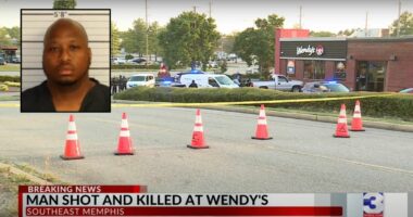 Wendy's manager shoots man during fight over employee, then slaps victim as he lay dying on the ground, police say